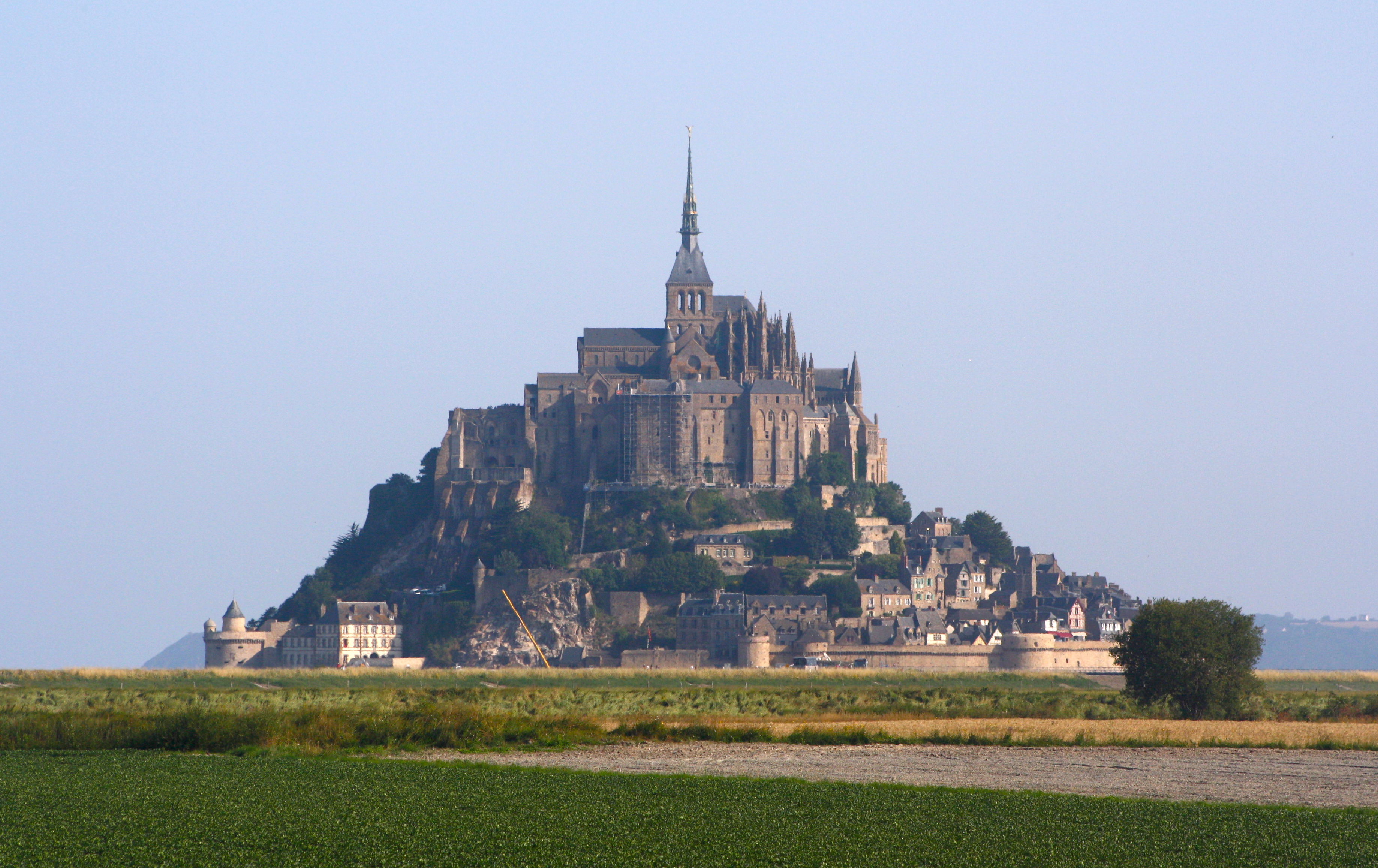 The Allure of Mont-Saint-Michel's Tide: Witnessing the Astonishing Phenomenon and Navigating the Changing Landscape